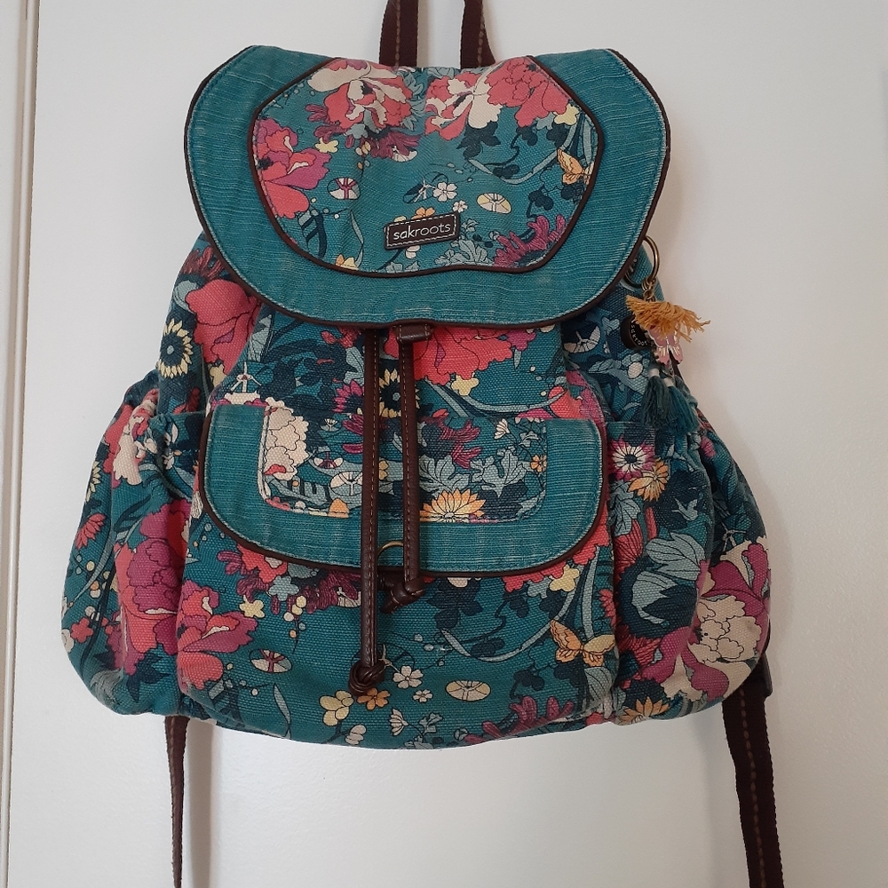 Sakroots backpack with makeup bag.